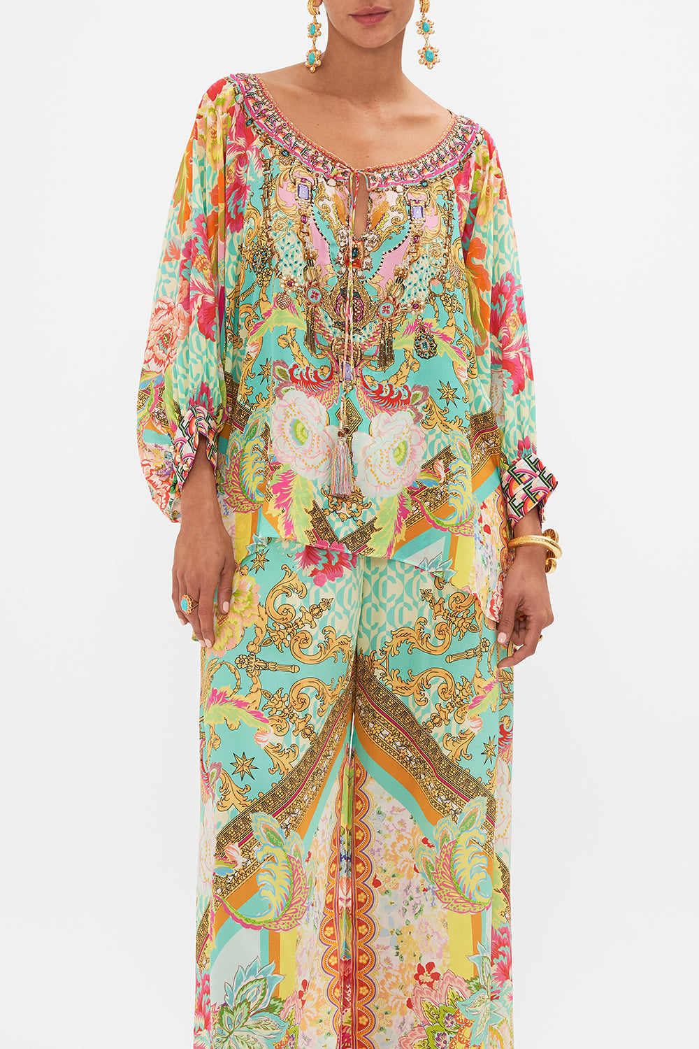 Crop view of model wearing CAMILLA printed silk blouse in An Italian Welcome print