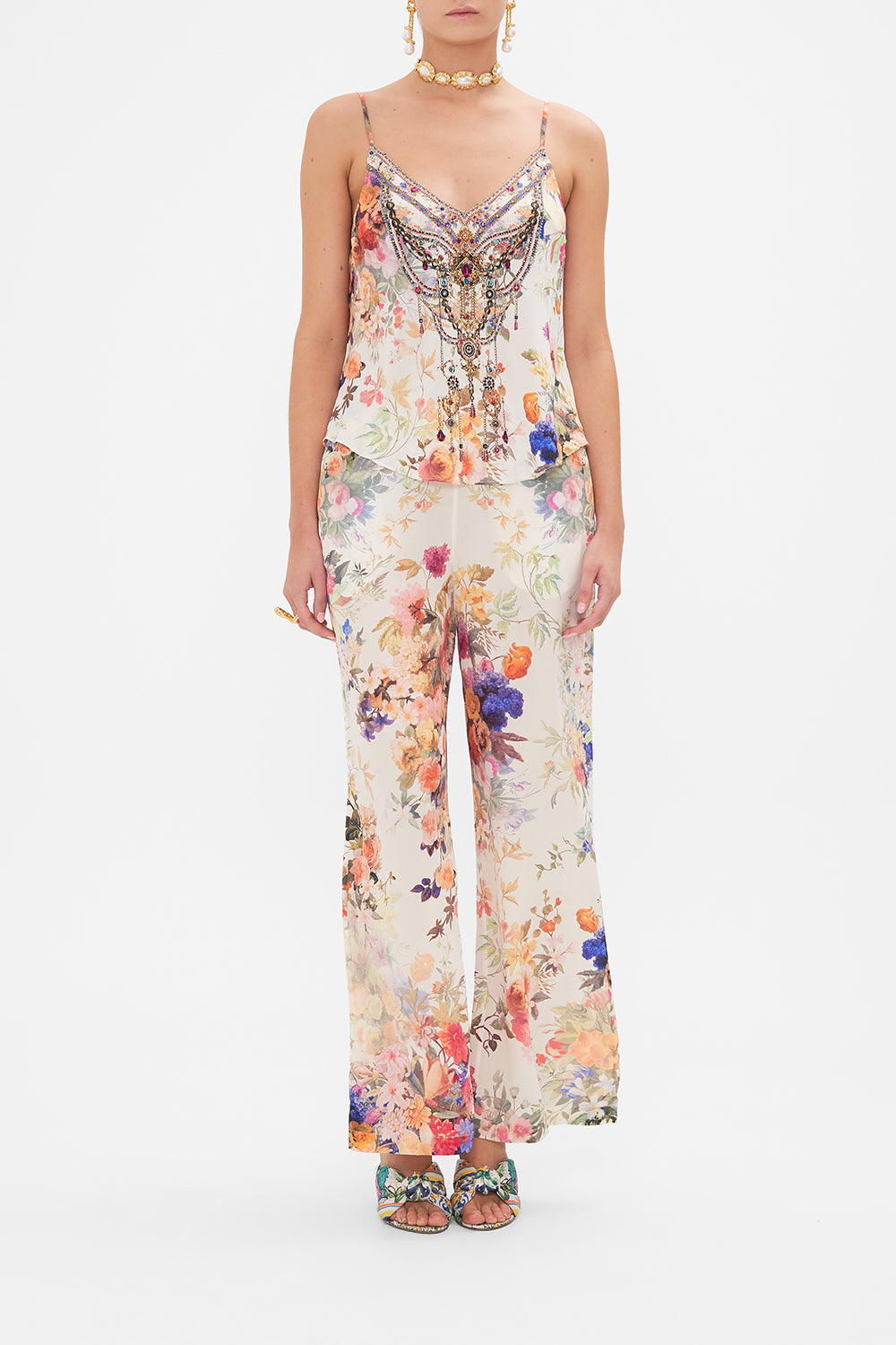 Front view of model wearing CAMILLA silk v-neck top in Friends With Frescos print