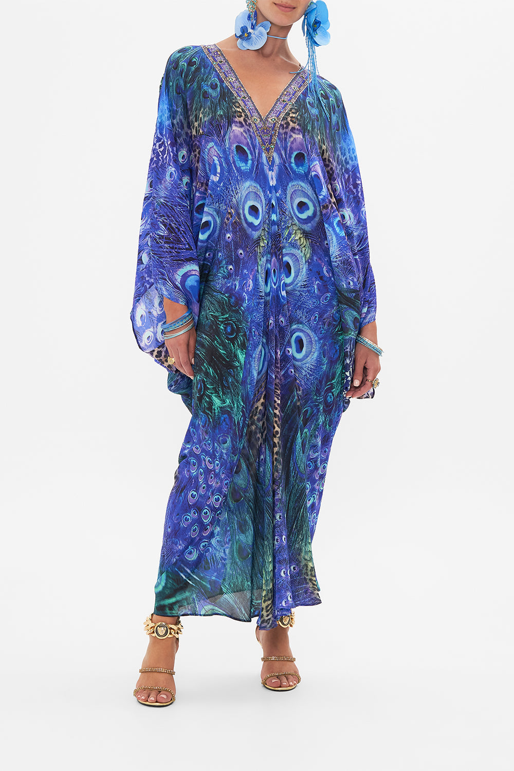 Front view of model wearing CAMILLA silk kaftan in Peacock Rock print