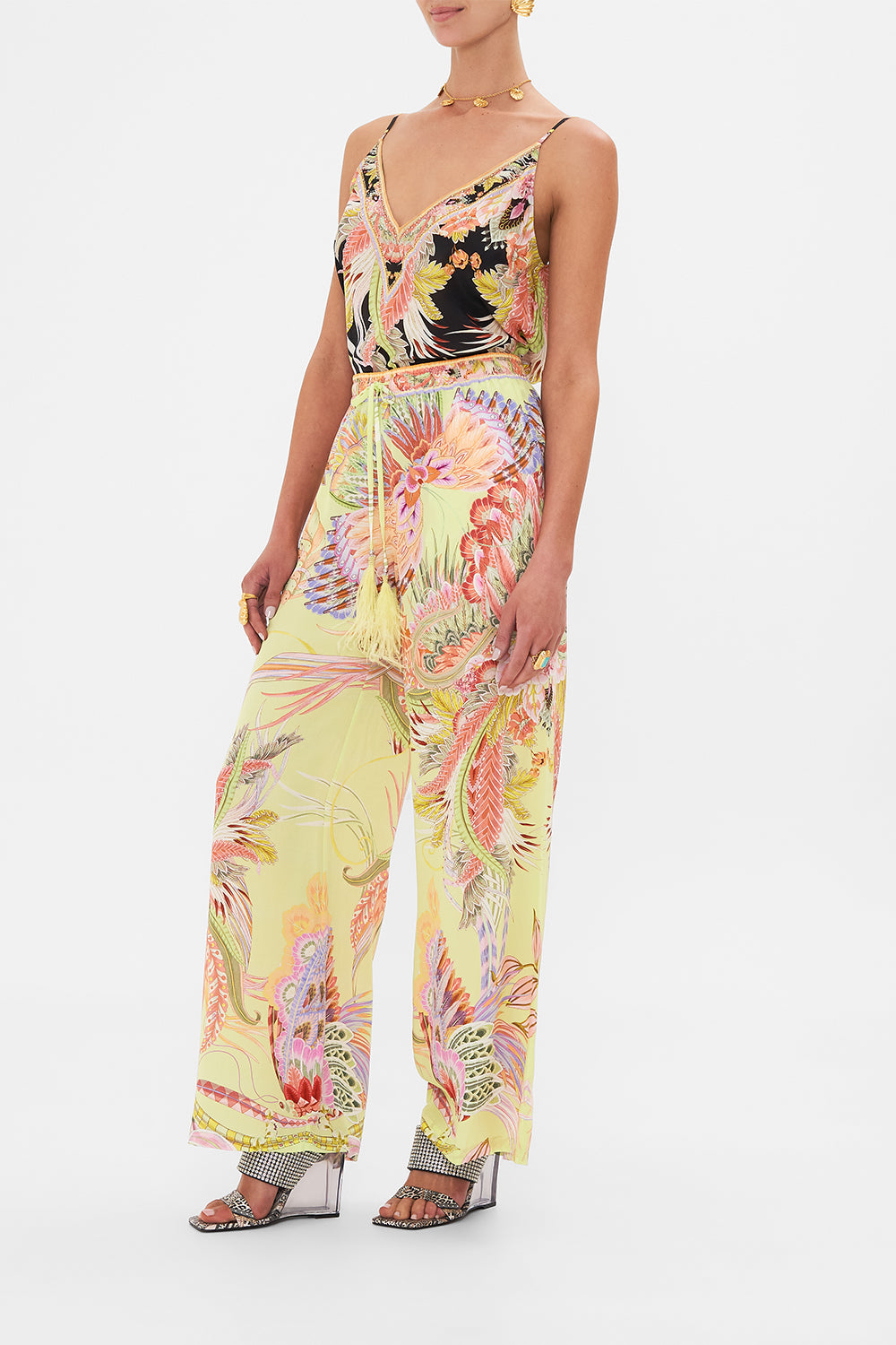 Side view of model wearing CAMILLA silk pants Cosmic Tuscan print