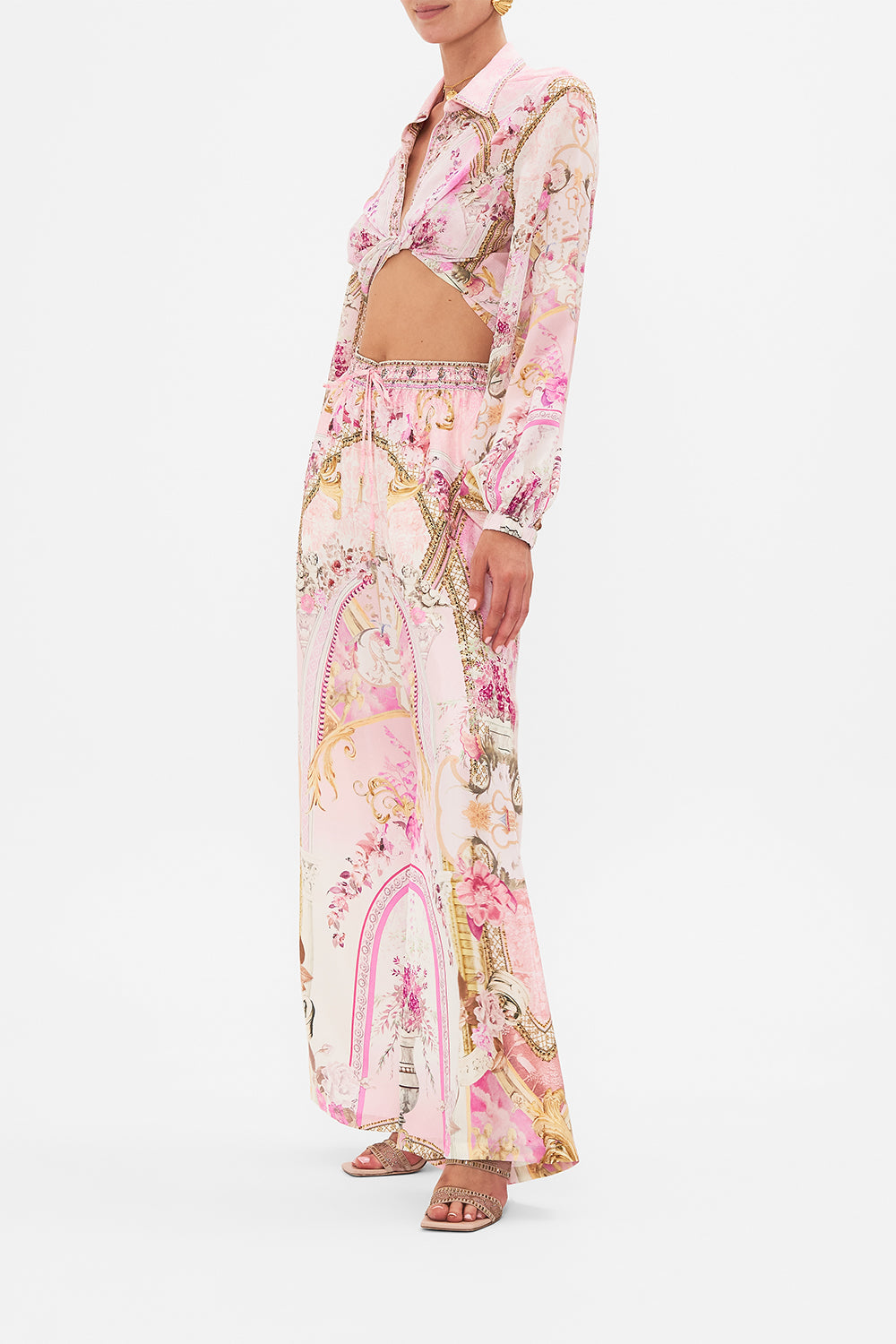 Side view of model wearing CAMILLA silk lounge pant in Feeling Fresco print
