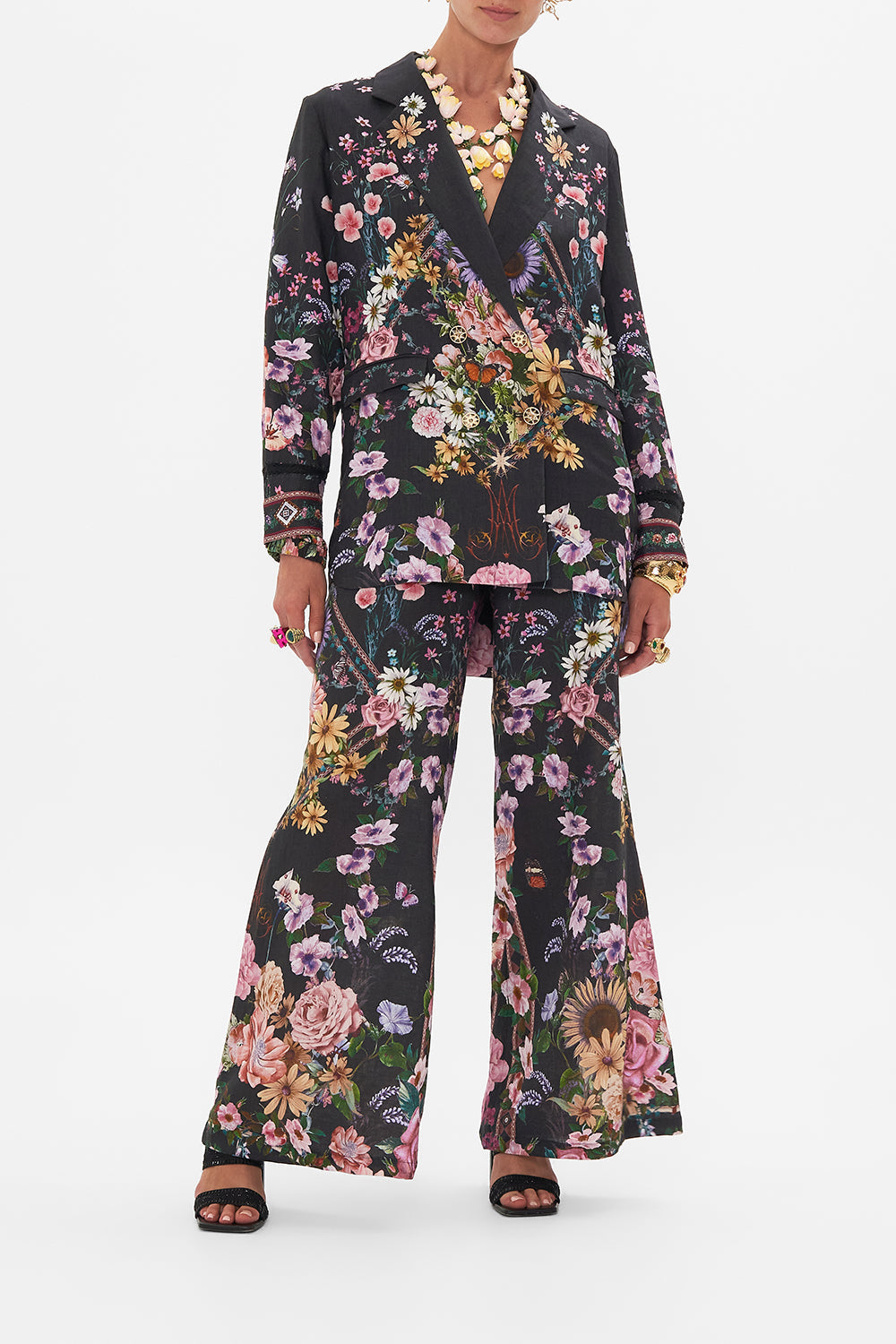 Front view of model wearing CAMILLA silk jacket in Letters From A Vineyard print