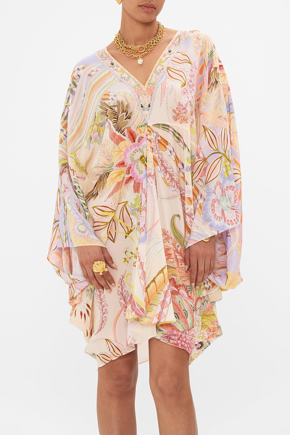 Crop view of model wearing CAMILLA silk kaftan in Cosmic Tuscan print