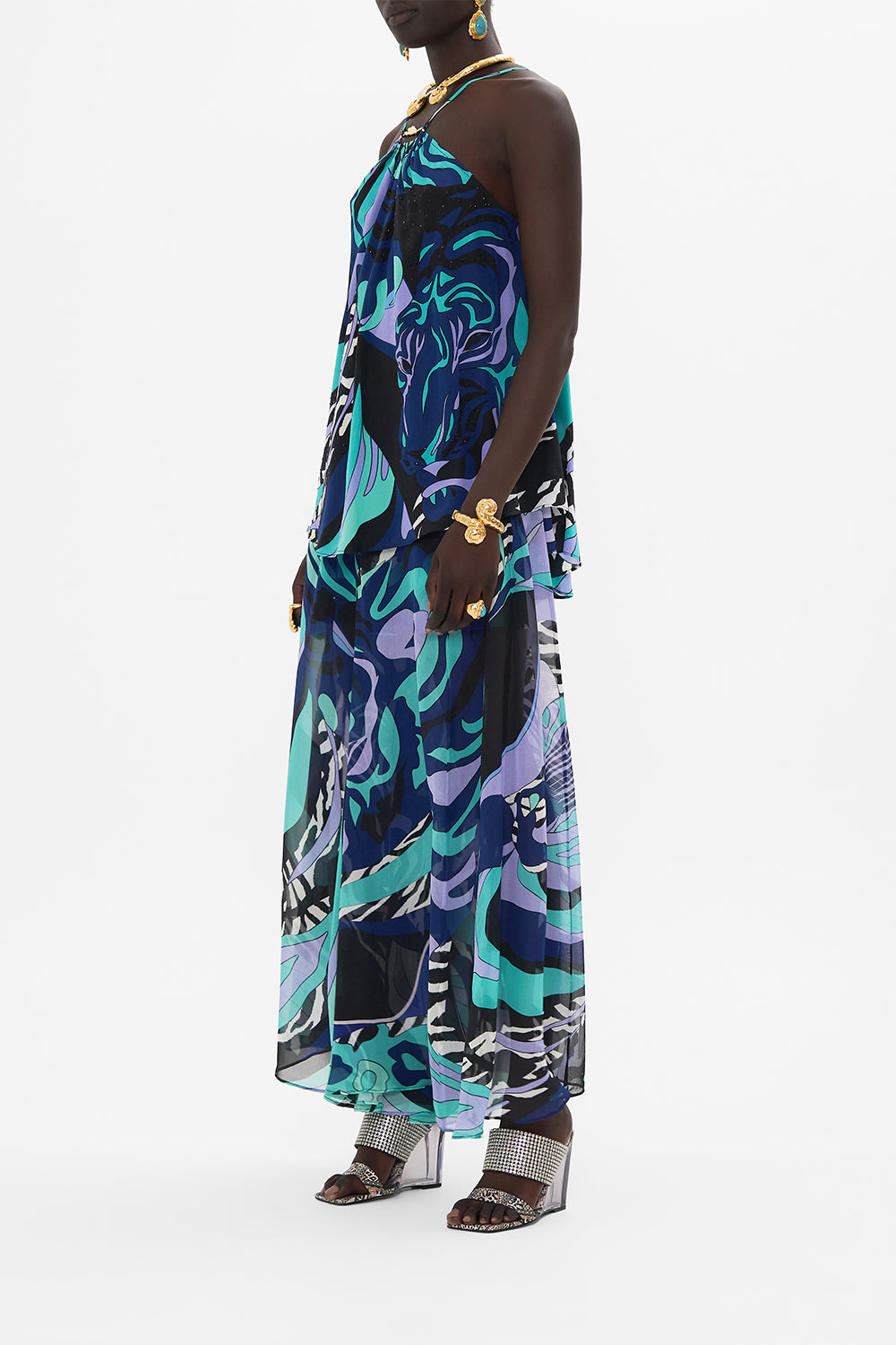 Side view of model wearing CAMILLA silk halter top in Vividly Venice print