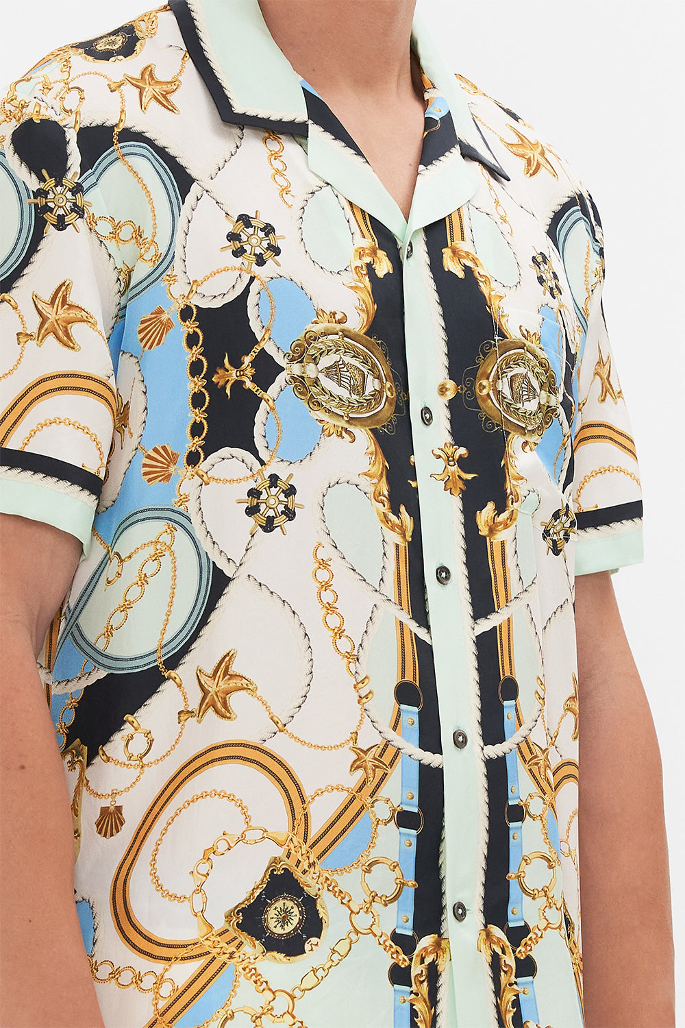 Detail view of model wearing Hotel Franks By CAMILLA mens shirt Sea Charm print