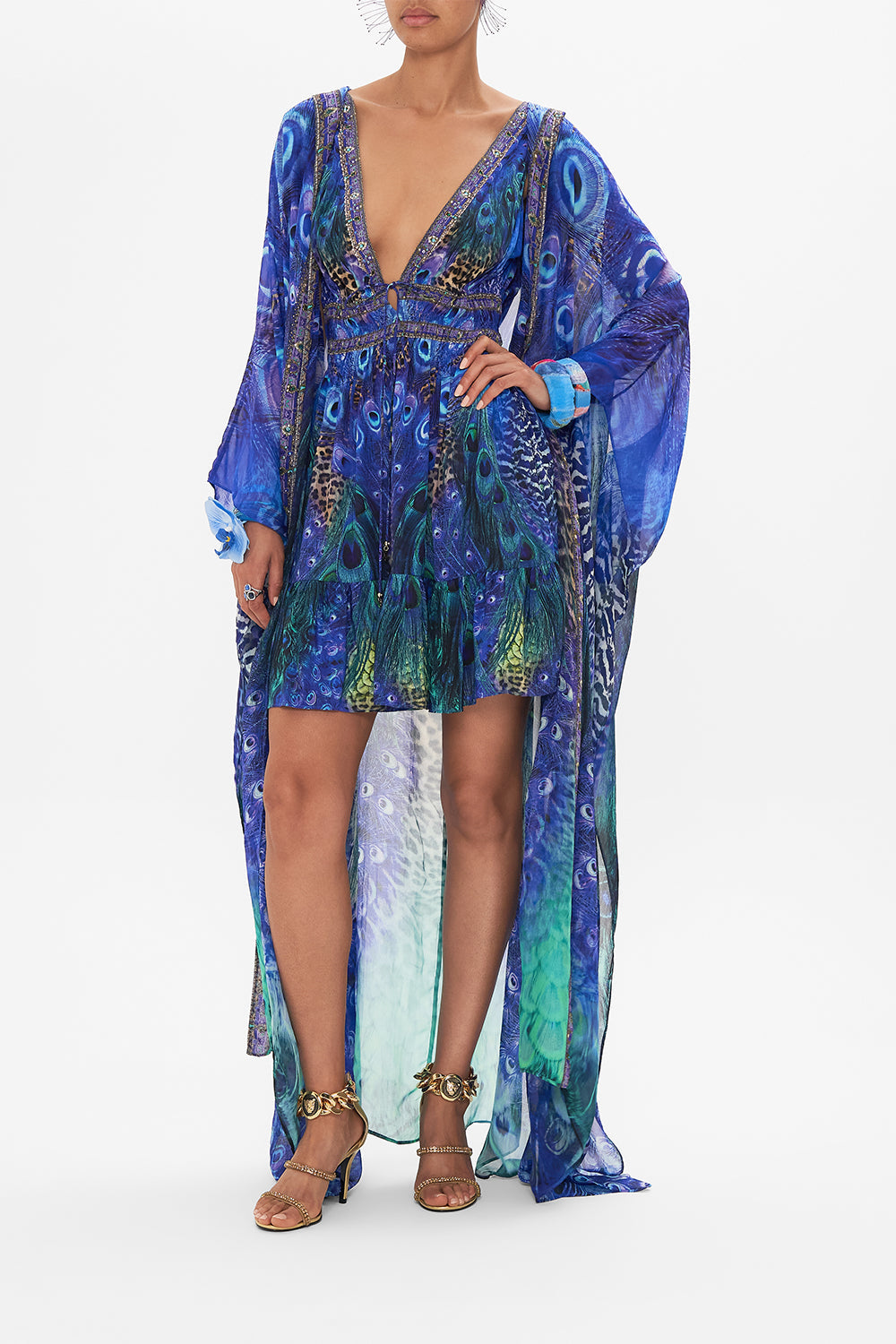 Detail view of model wearing CAMILLA silk minin dress in Peacock Rock print