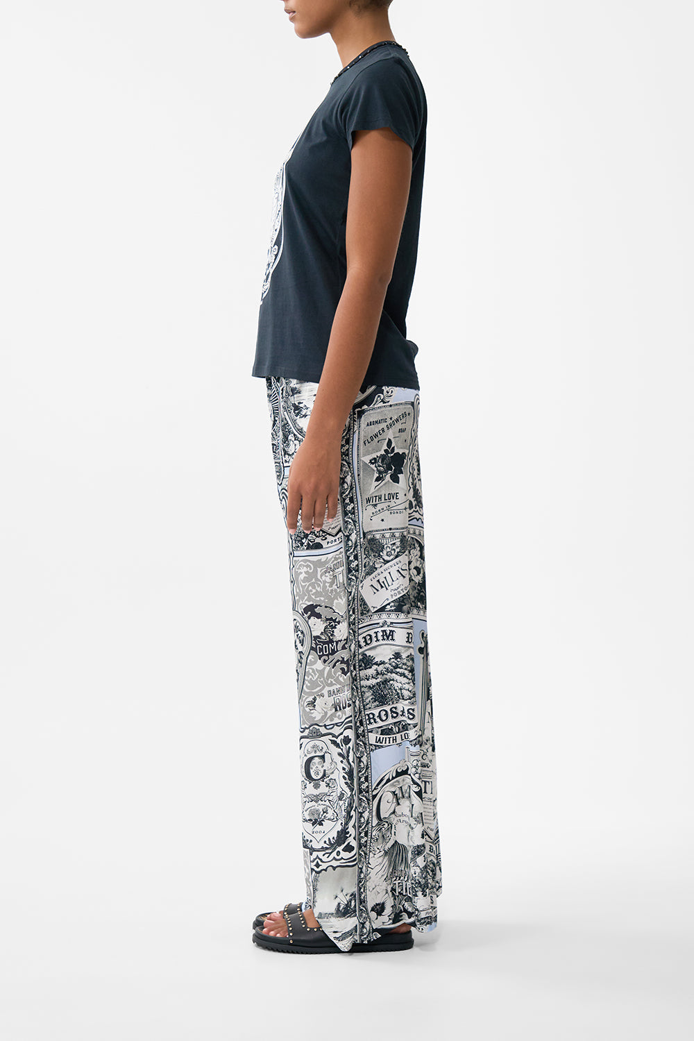 The CAMILLA Slim Fit Round Neck T-Shirt - Black in our Perfumed In Porto print.