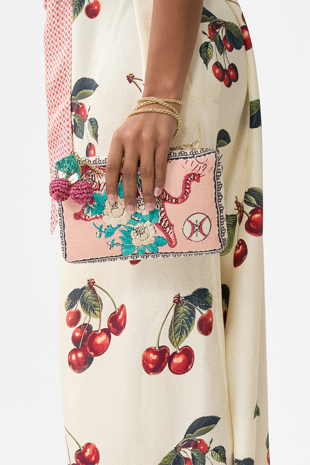 HARDCASE CLUTCH WITH RAFFIA DETAIL NOTES FROM THE ROAD