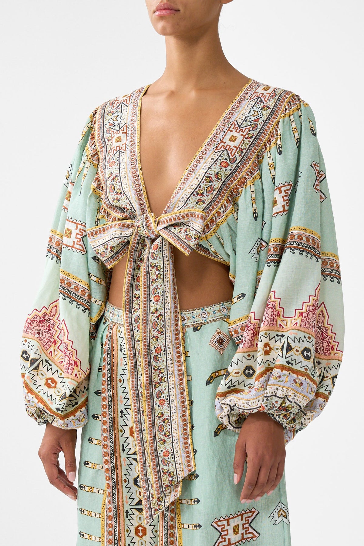 CROPPED BLOUSON SLEEVE TIE FRONT TOP LEGEND HAS IT