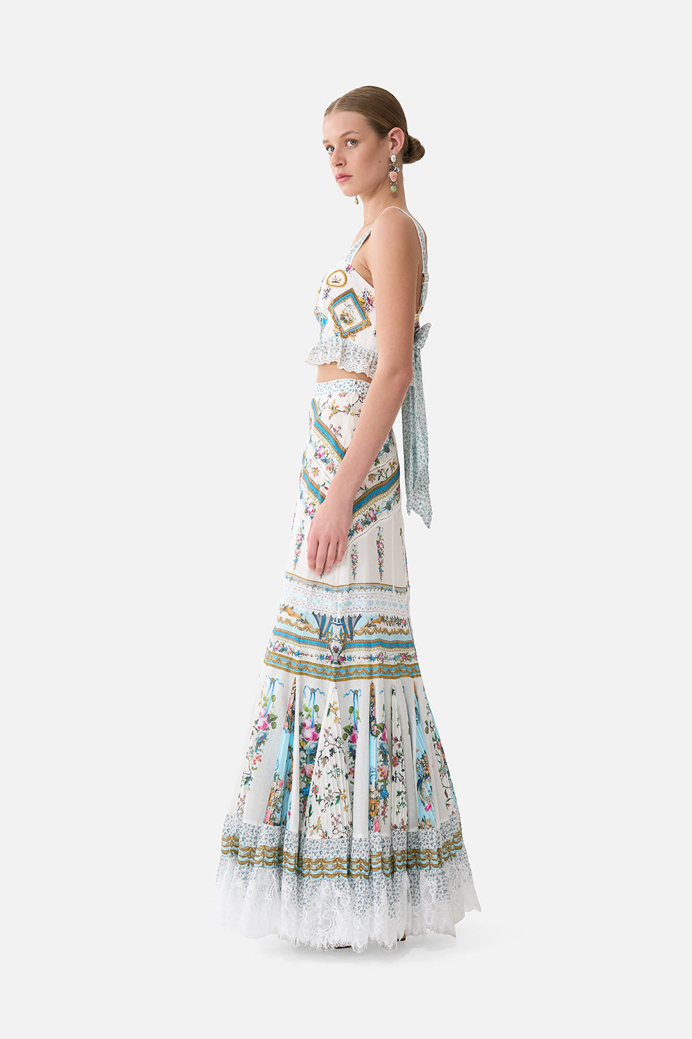 The CAMILLA SQUARE NECK SHORT DRESS WITH PINTUCKS DANDELION SKIES in our print.