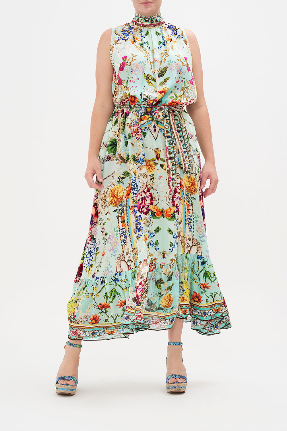 Front view of curvy model wearing CAMILLA plus size silk maxi dress in Honey Honey print