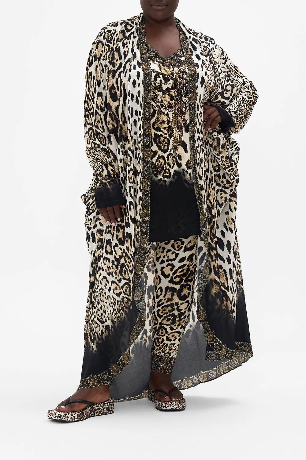 Front view of curvy model wearing CAMILLA plus size leopard print silk jacket in Cool For Cats print