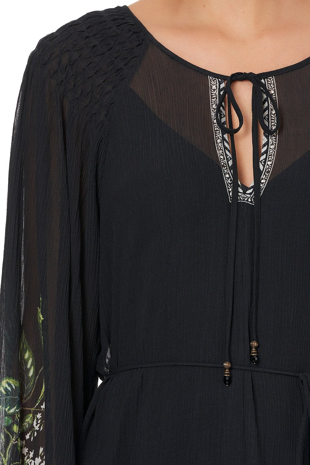 DRESS WITH SMOCKED SLEEVE RAISED WITH WOLVES