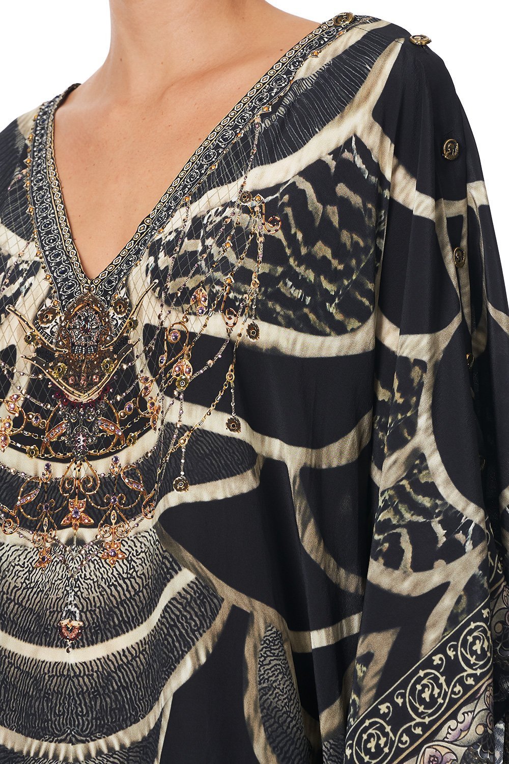 KAFTAN WITH BUTTON UP SLEEVES UNDER A FULL MOON