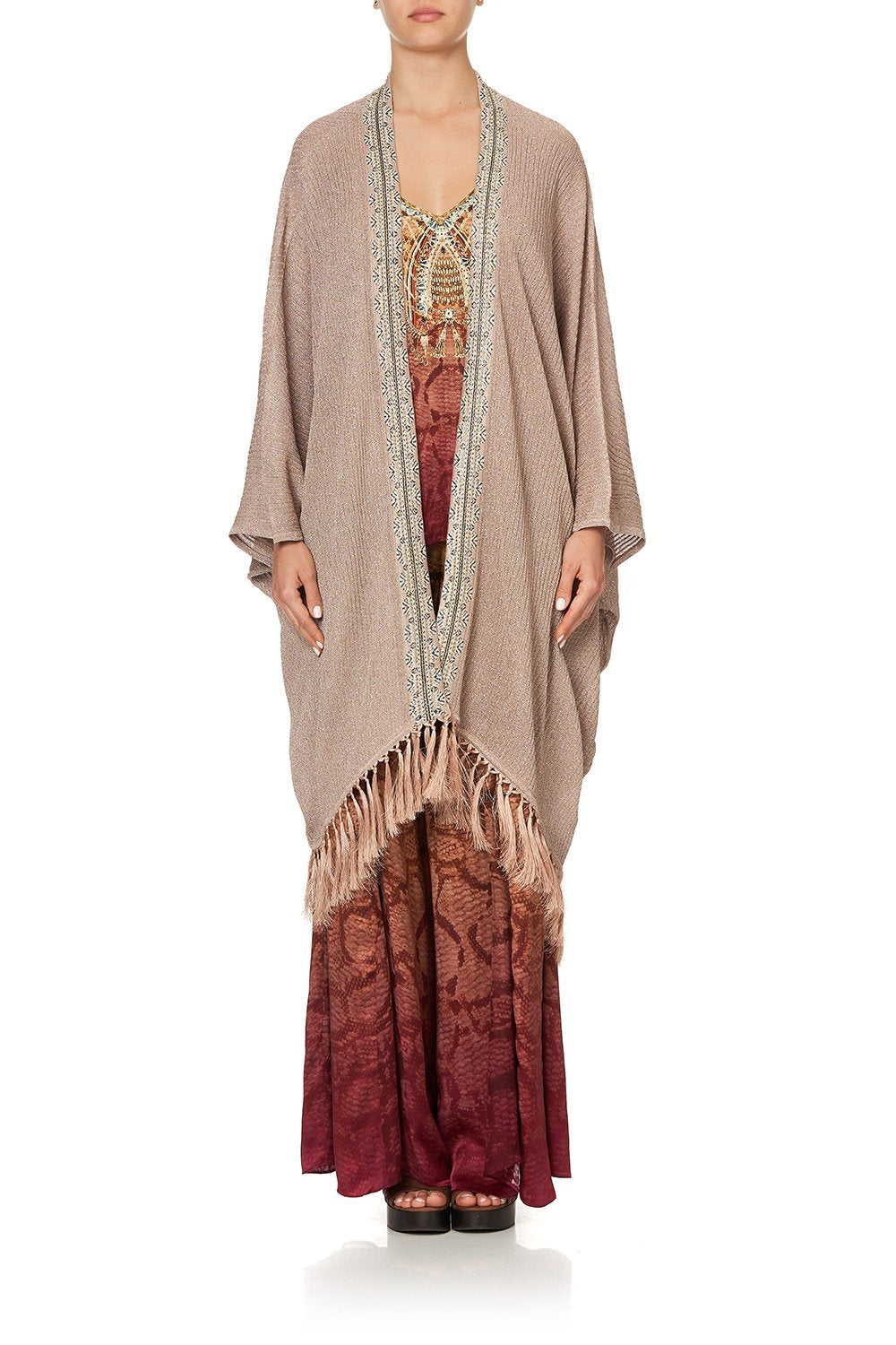 METALLIC KNIT PONCHO WITH TASSELS COASTAL TREASURE