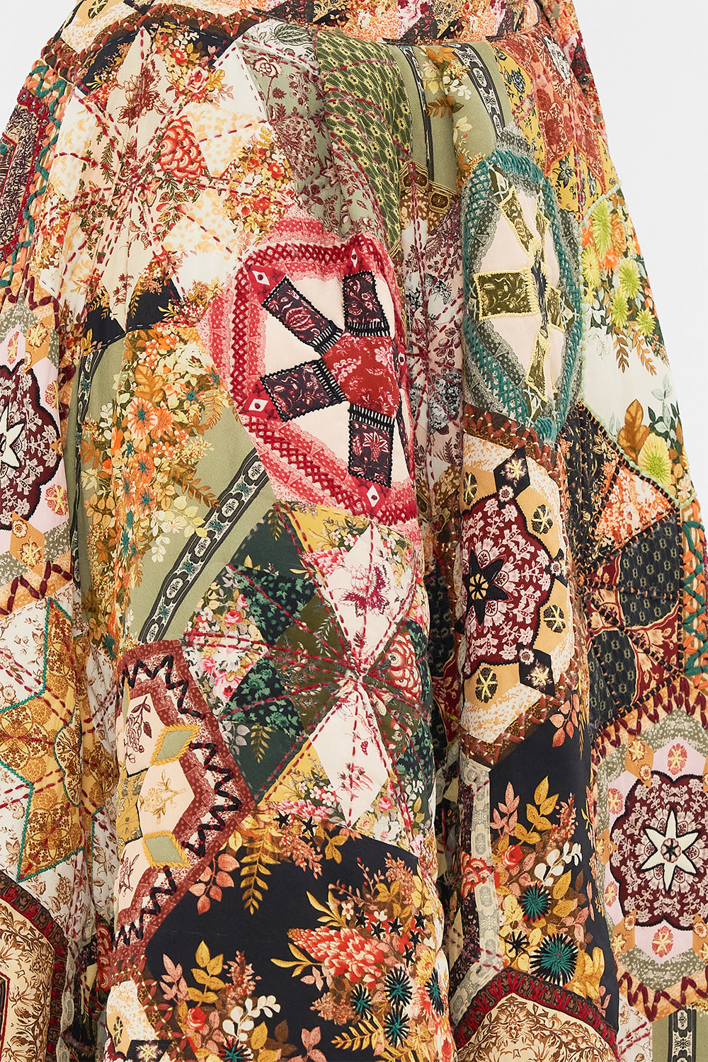 The CAMILLA OFF SHOULDER KNIT TOP ETCHED INTO ETERNITY in our  print.