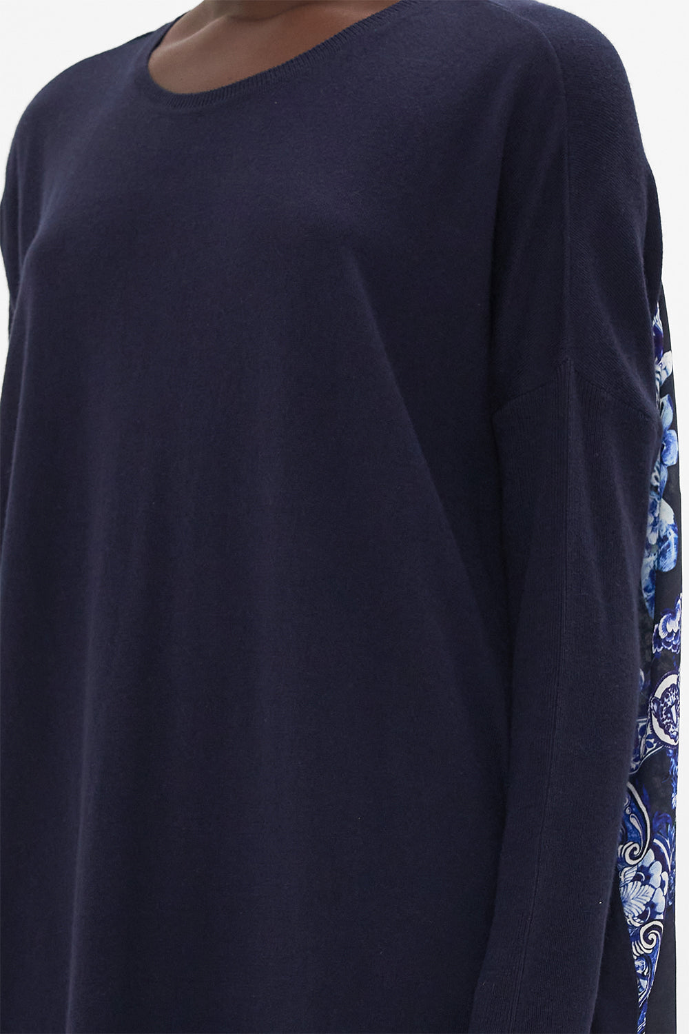 Detail view of model wearing CAMILLA printed jumper in Delft Dynasty print 