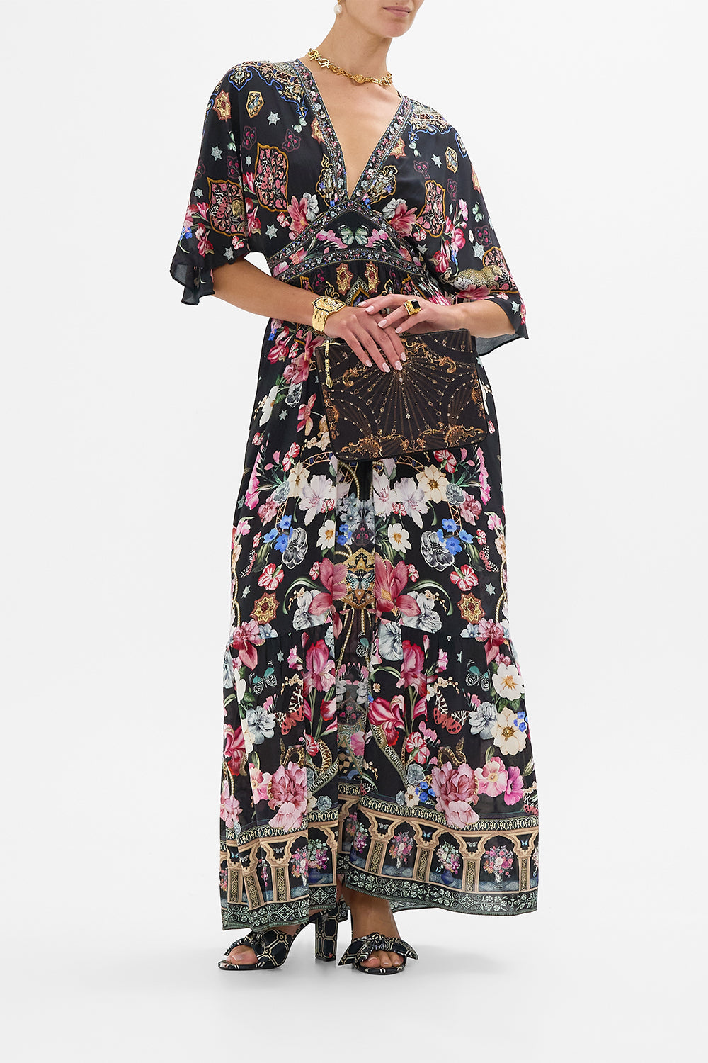The CAMILLA SHORT KAFTAN WITH CUFF WELCOME TO THE WHITE LOTUS in our  print.
