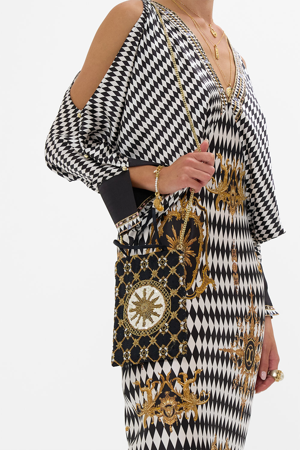 The CAMILLA SMALL CANVAS CLUTCH AROMATIC AMOR in our  print.