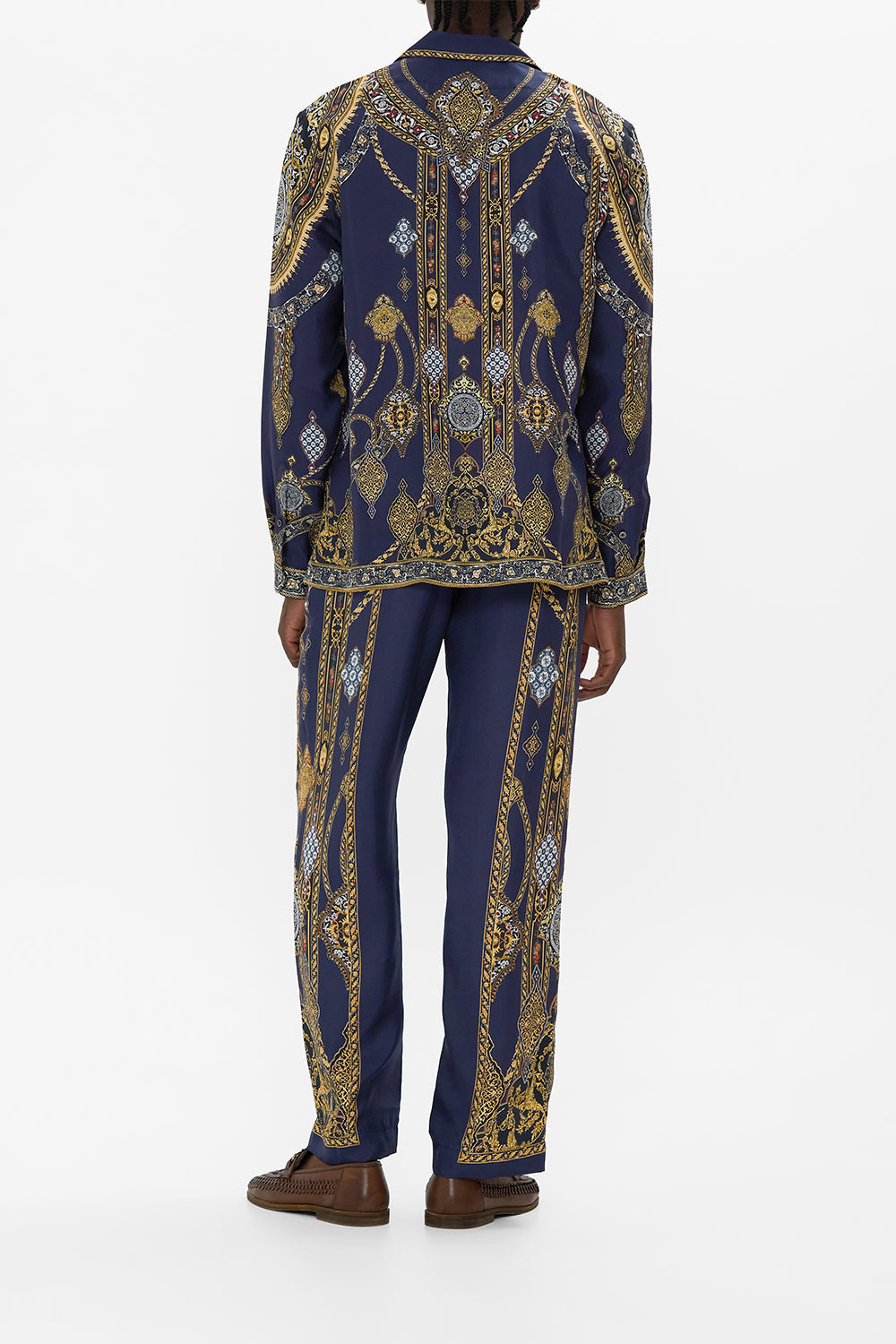 The CAMILLA BUTTON UP TOP WITH DRAPED BACK COSMIC ZOOLOGY in our  print.