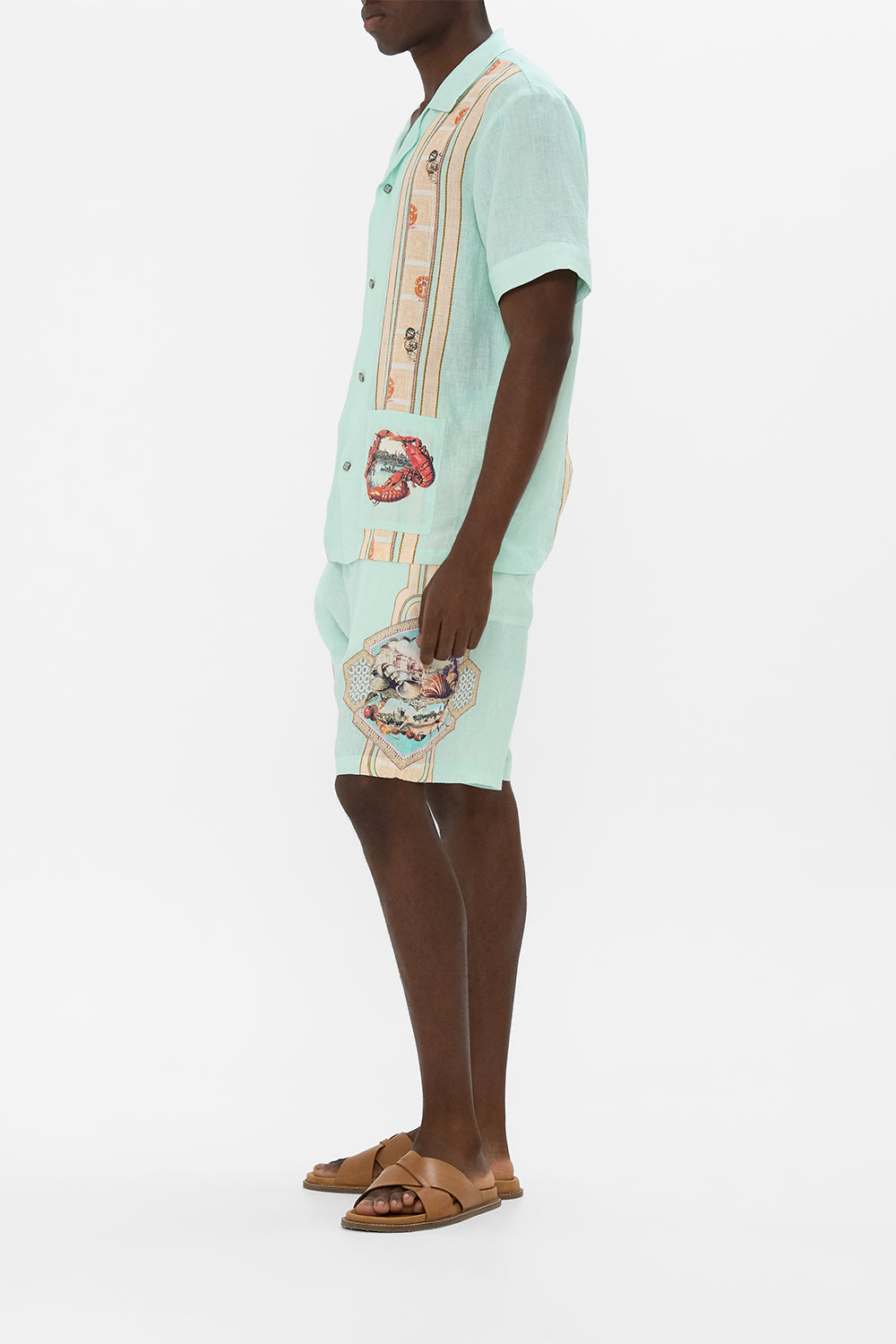 The CAMILLA LONG SLEEVE LONG CAPE THE CONCUBINES CORRIDOR in our  print.