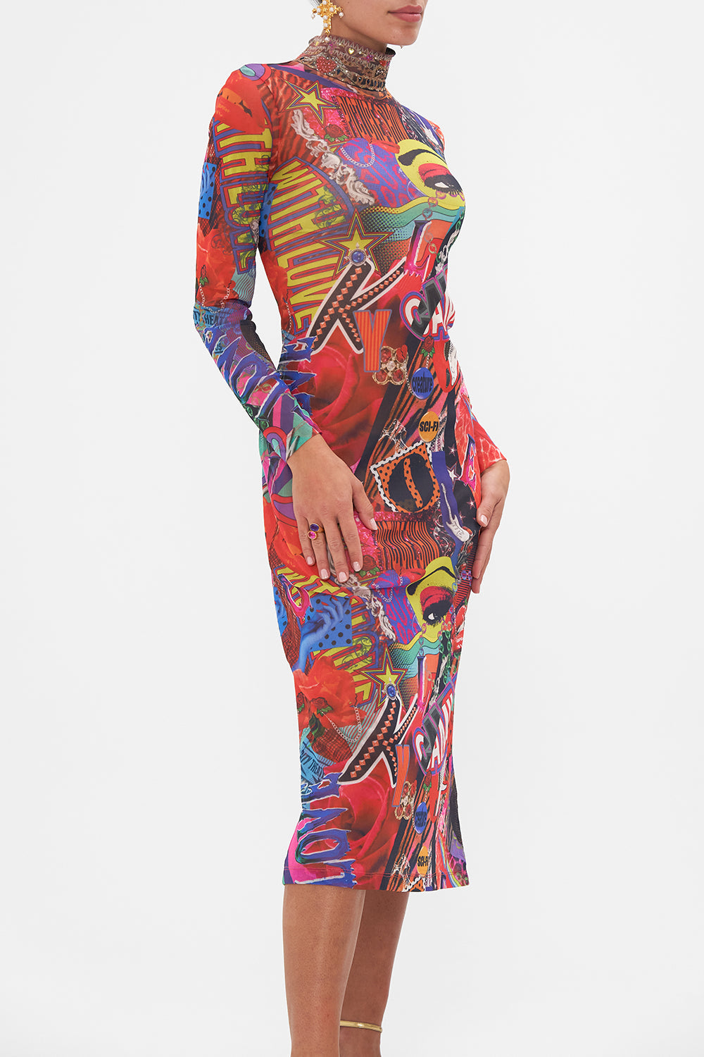 Crop view of model wearing CAMILLA mesh turtleneck dress in multicoloured Radical Rebirth print