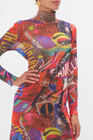 Detail view of model wearing CAMILLA mesh turtleneck dress in multicoloured Radical Rebirth print