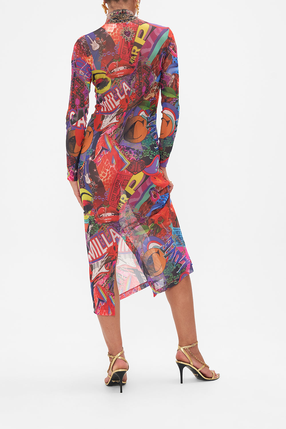 Back view of model wearing CAMILLA mesh turtleneck dress in multicoloured Radical Rebirth print