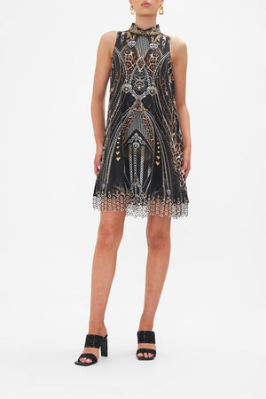 Front view of model wearing CAMILLA silk shift dress in Chaos In The Cosmos animal print