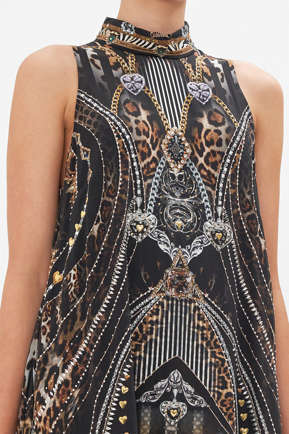 Detail view of model wearing CAMILLA silk shift dress in Chaos In The Cosmos animal print
