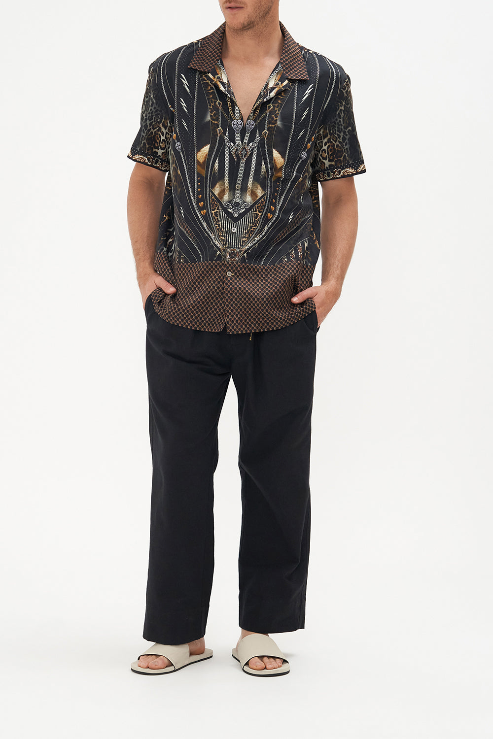 Front view of model wearing Hotel Franks by CAMILLA mens short sleeve camp collar shirt in Chaos in The Cosmos animal print 