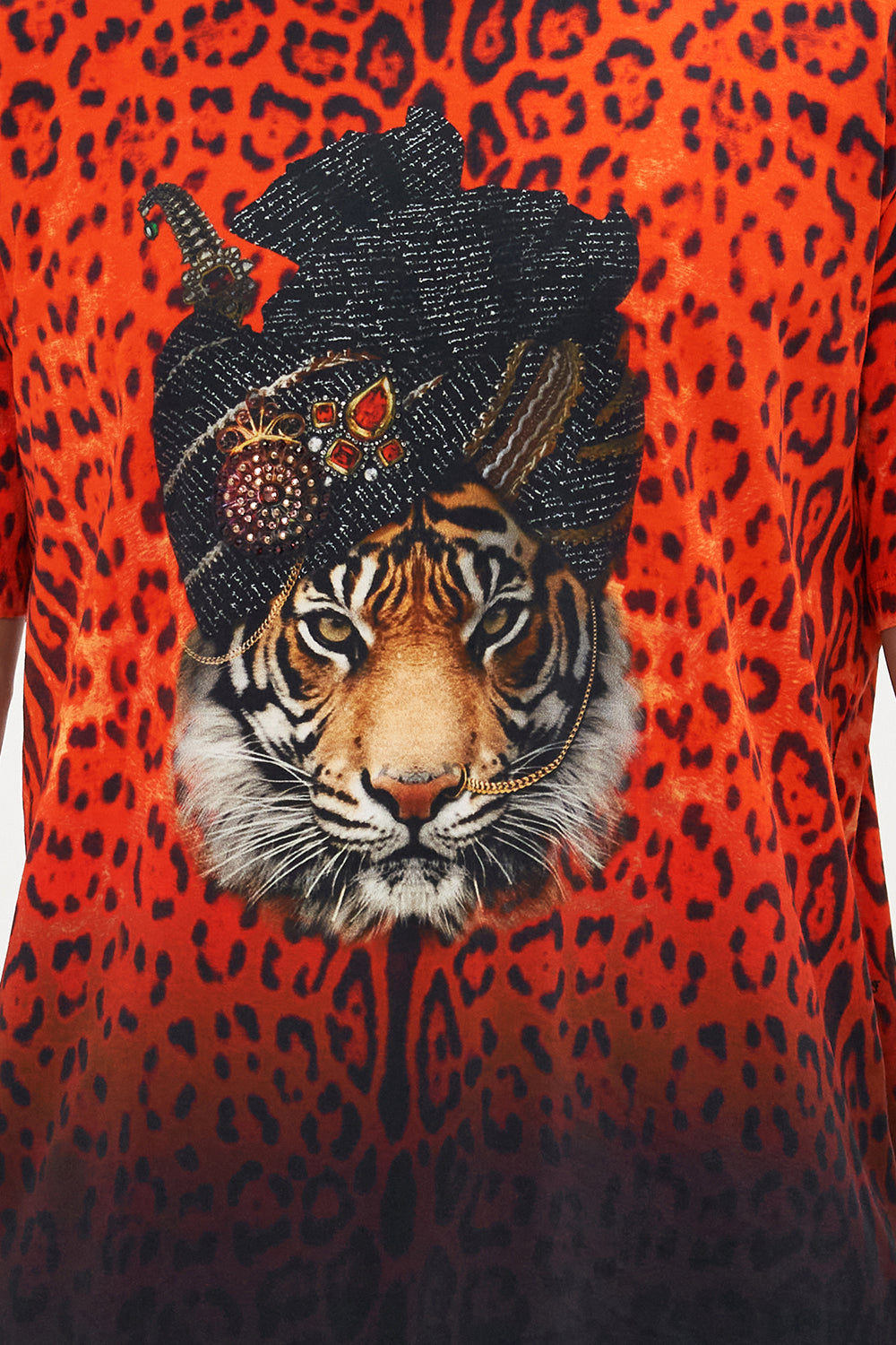 Crop view of model wearing Hotel Franks by CAMILLA mens relaxed fit tee in Chaos Magic graphic print 