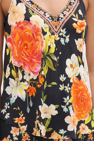 Detail view of model wearing CAMILLA floral silk cami in Secret History print
