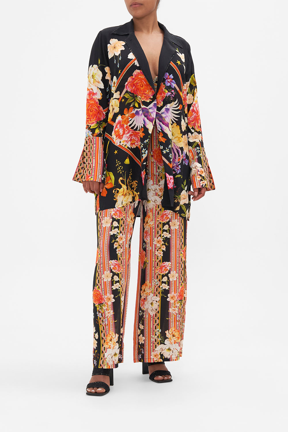 Front view of model wearing CAMILLA  silk jacket in Secret History floral print