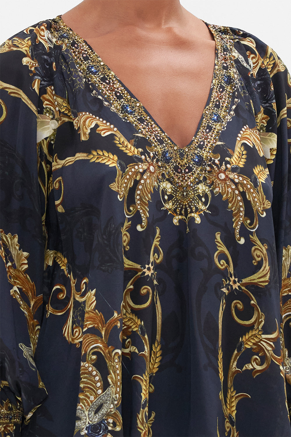 Detail view of model wearing CAMILLA navy silk blouse in Moonlight Melodies print