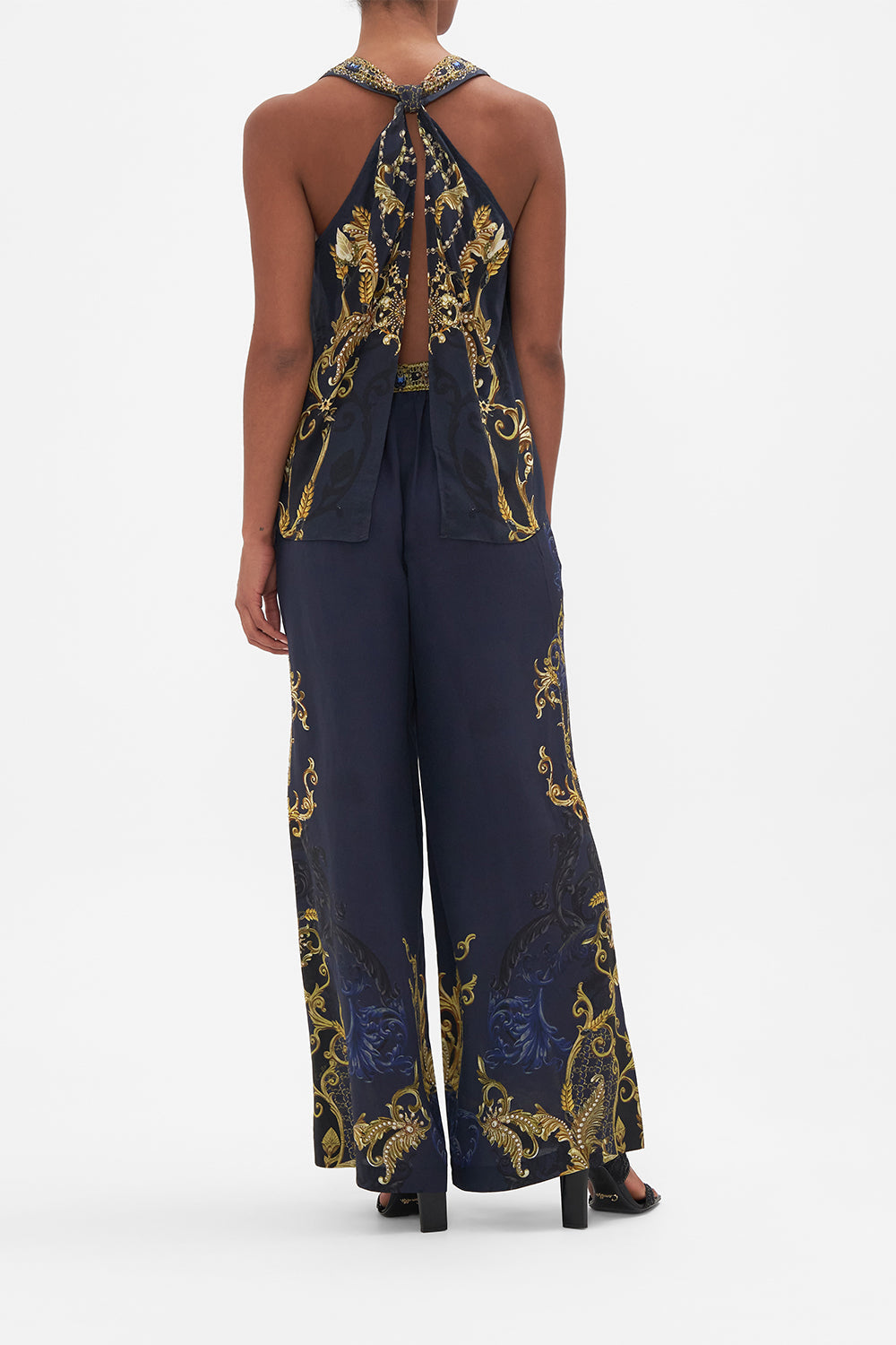 Back view of model wearing CAMILLA silk top in Moonlight Melodiesprint 