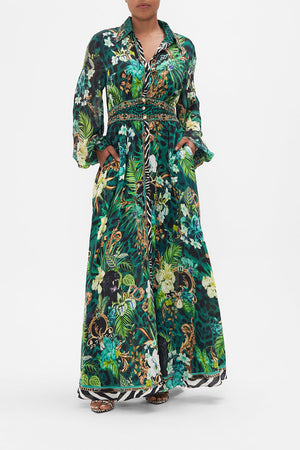 Front view of model wearing CAMILLA green silk shirt dress in Sing My Song print