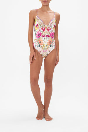 Front view of model wearing CAMILLA floral one piece swimsuit in Destiny Calling print