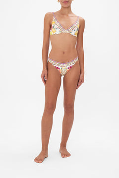 Front view of model wearing CAMILLA floral bikini top in Destiny Calling print