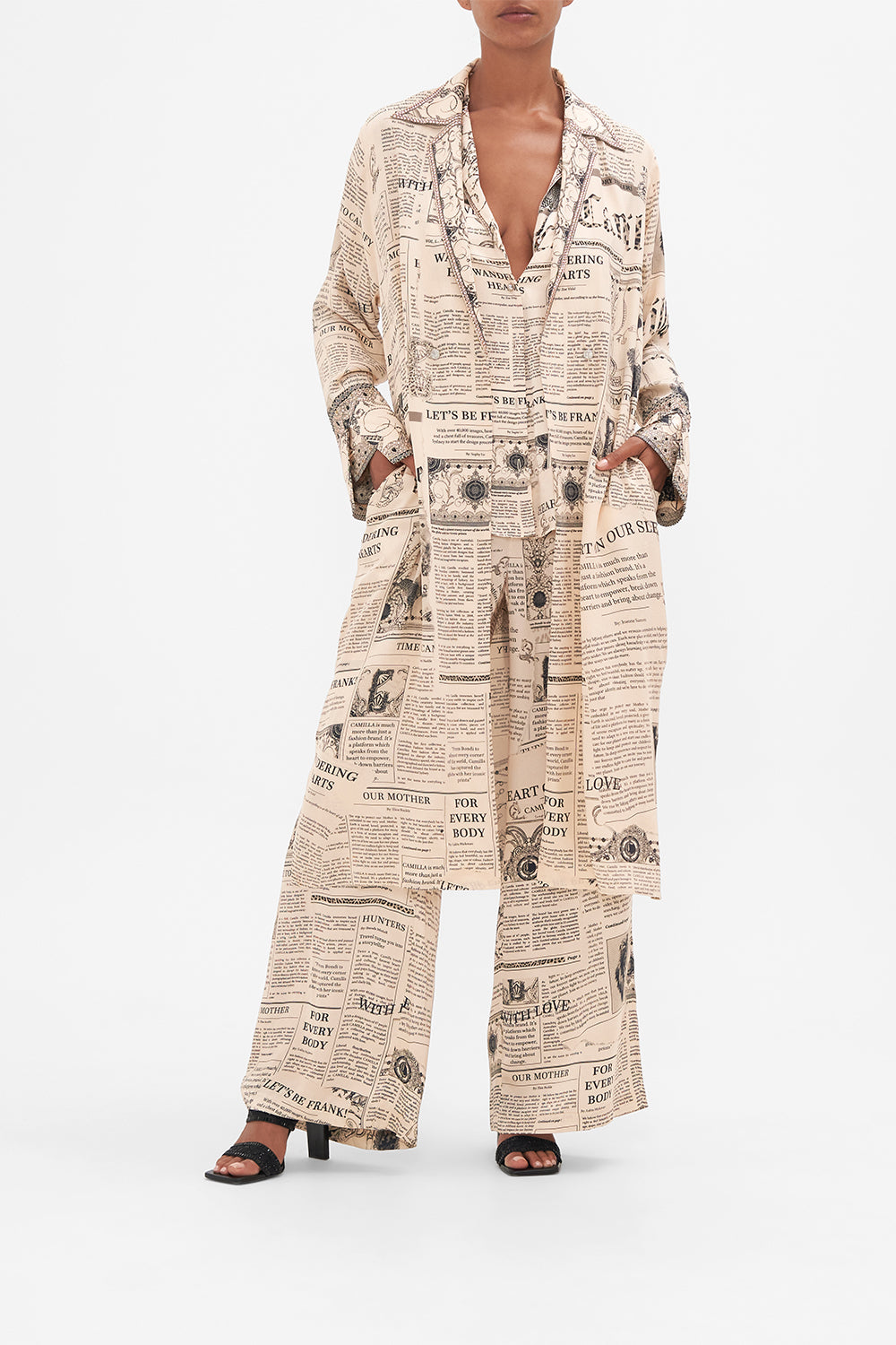 Front view of model wearing CAMILLA silk jacket in Fame fever print