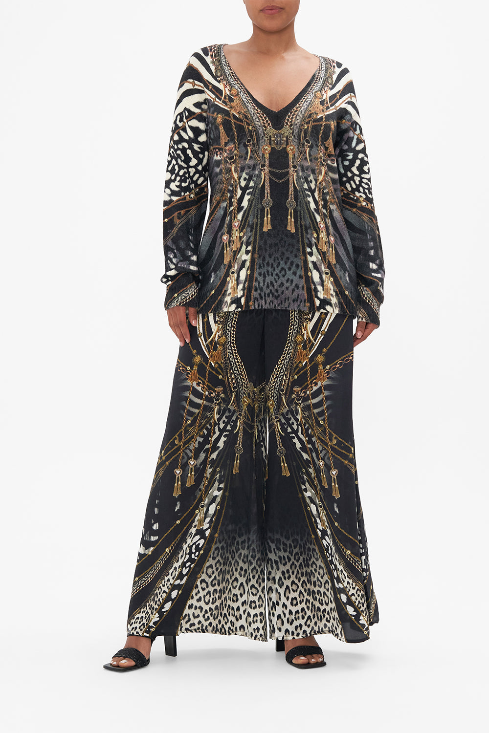 Front view of model wearing CAMILLA animal print jumper in Untamed Royalty print