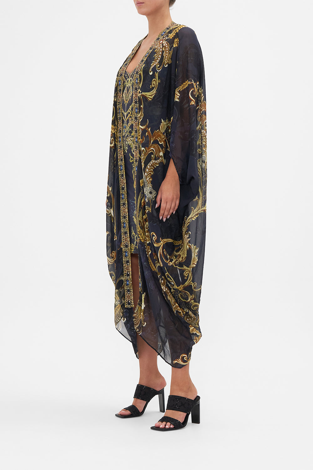 Side view of model wearing CAMILLA silk kimono in Moonlight Melodies print