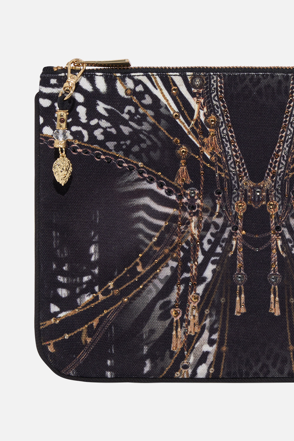 Detail view of CAMILLA clutch bag in Untamed Royalty print