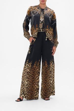 Front view of model wearing CAMILLA leopard print bomber jacket in Jungle Dreaming print