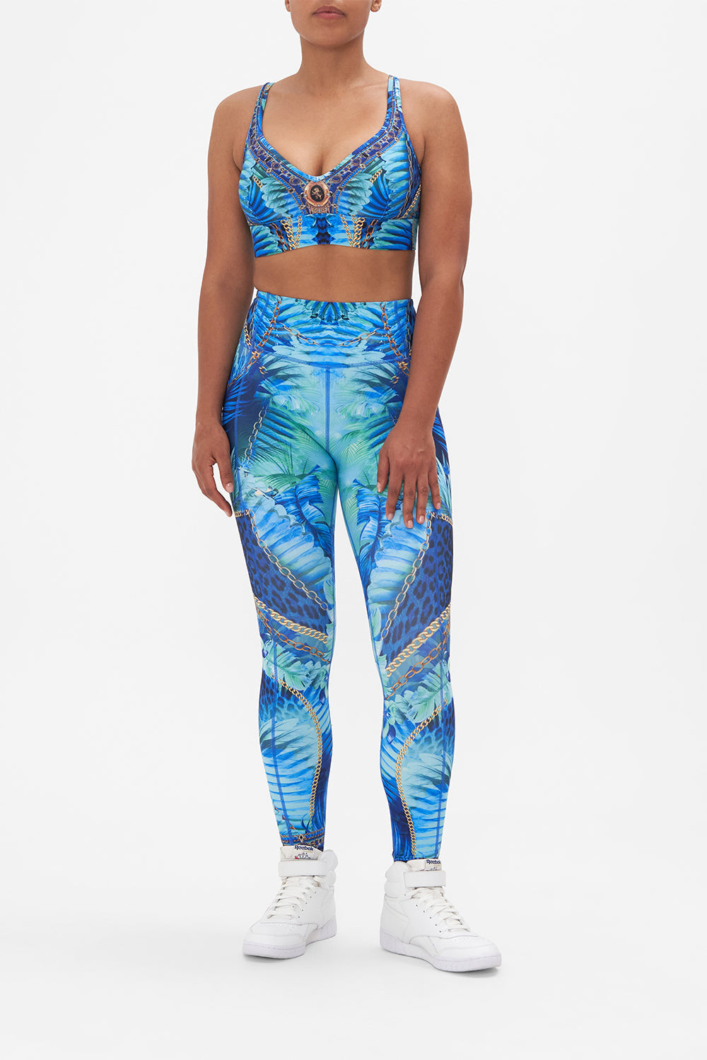 Front view of model wearing CAMILLA activewear sports crop top in Song Of The Jungle print