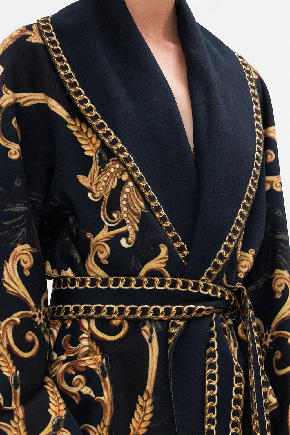 Detail view of model wearing CAMILLA long wool coat in Moonlight Melodies print