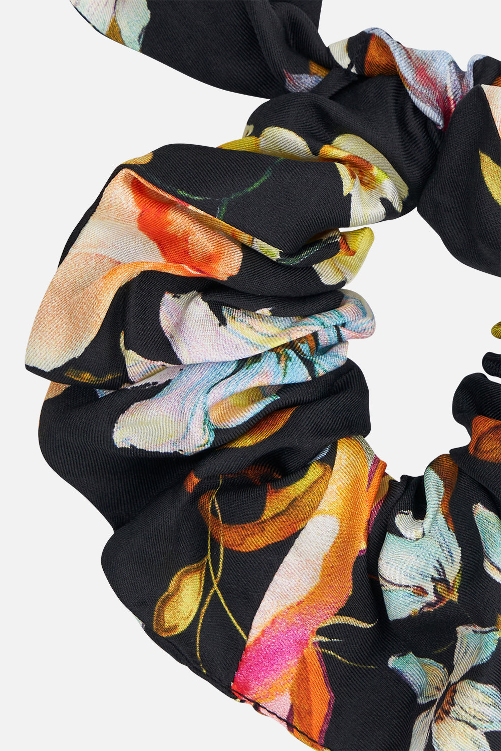 Detail view of CAMILLA silk floral scrunchie in Secret History print 
