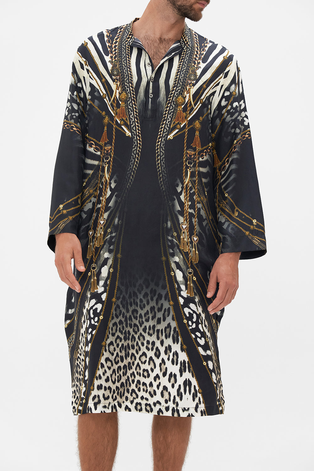 Crop view of model wearing Hotel Franks by CAMILLA mens black silk kaftan in Untamed Royalty Print