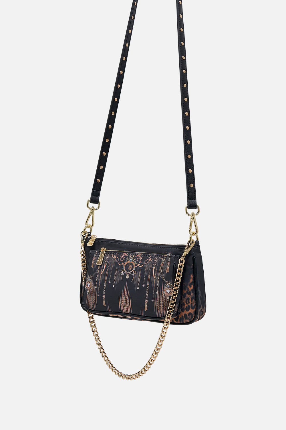 Side view of CAMILLA black nylon bag in Jungle Dreaming animal print 