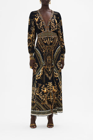 Front view of model wearing CAMILLA black and gold maxi dress in Duomo Dynasty print